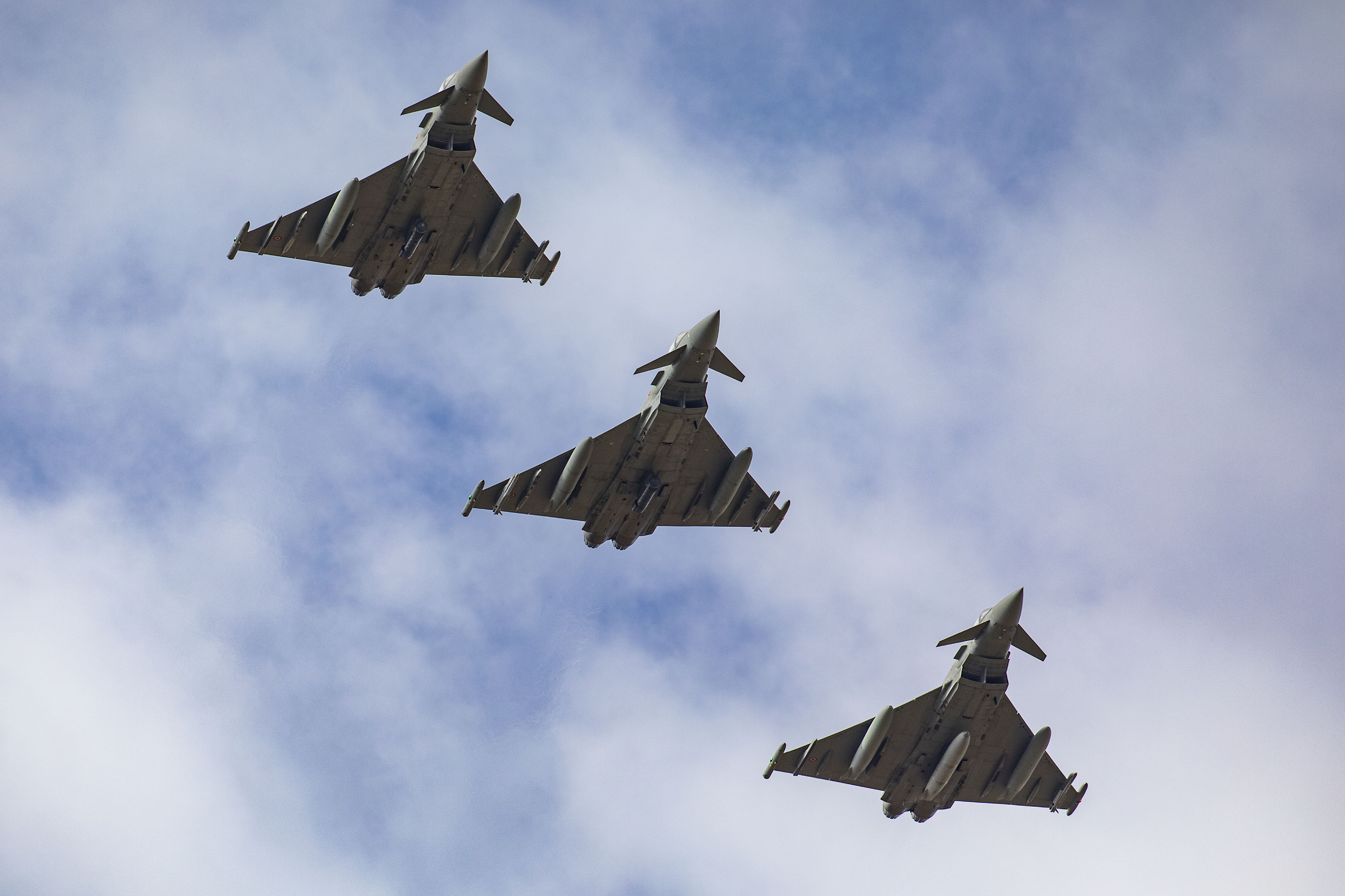 Image shows three aircraft in flight.